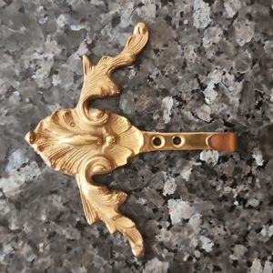Vintage brass hook.